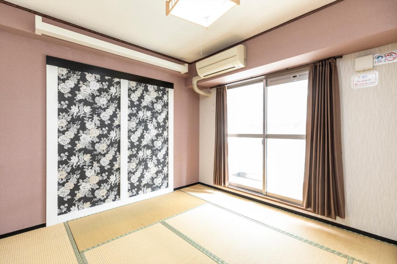Ryokan Sinsekai - Tourpalace Ōsaka Extérieur photo