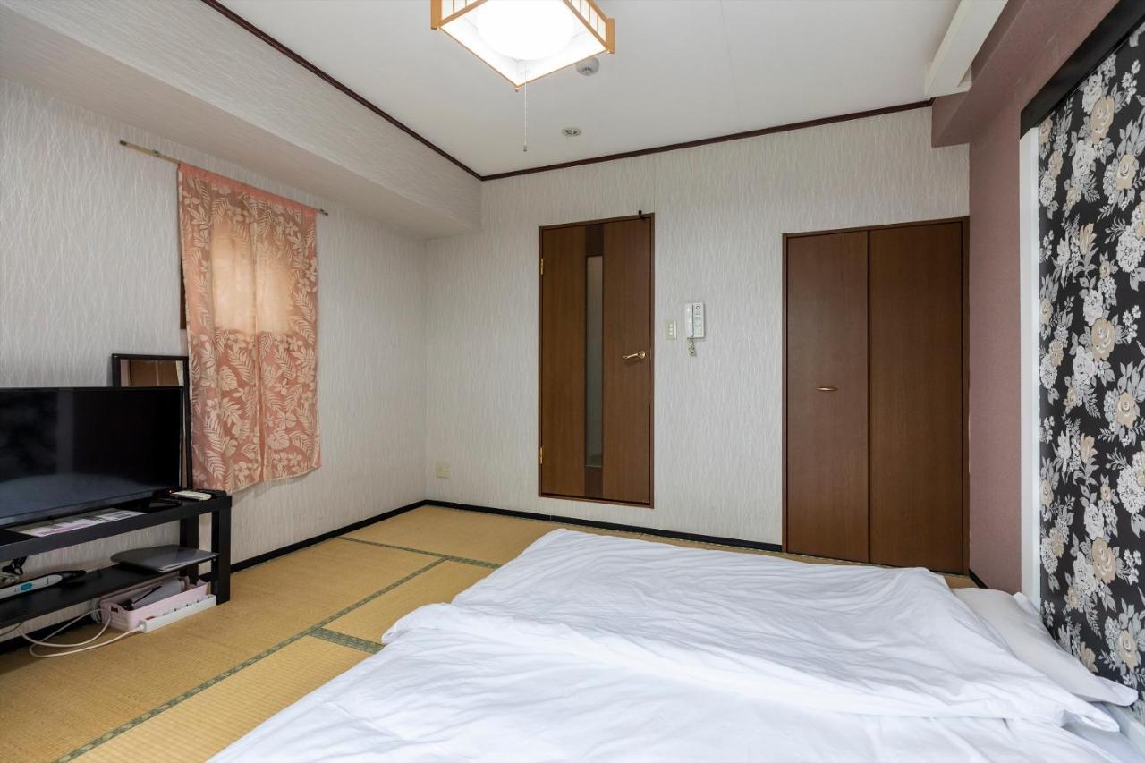 Ryokan Sinsekai - Tourpalace Ōsaka Extérieur photo